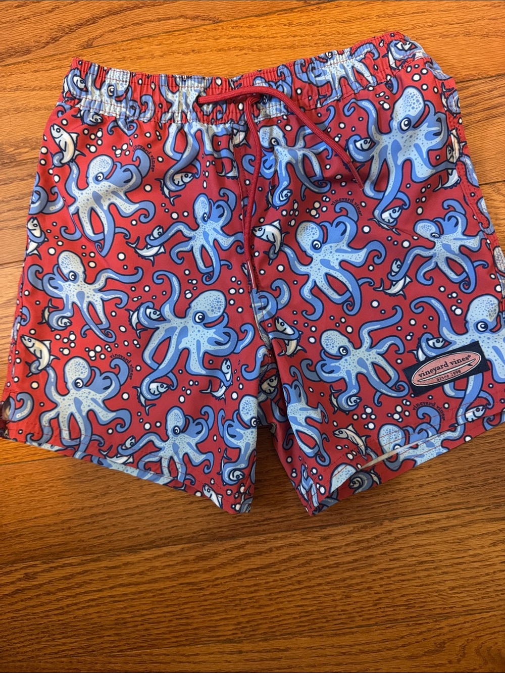 Vineyard Vines boys size 7 like new Red Swim Shorts with Blue Octopus Print